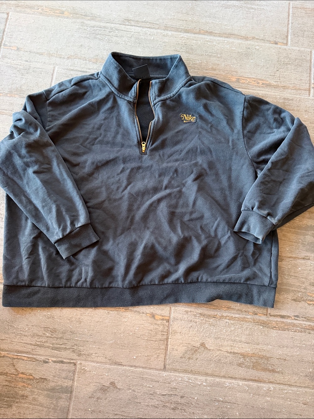 Nike Men’s Black Quarter-Zip Sweater with Gold Accent